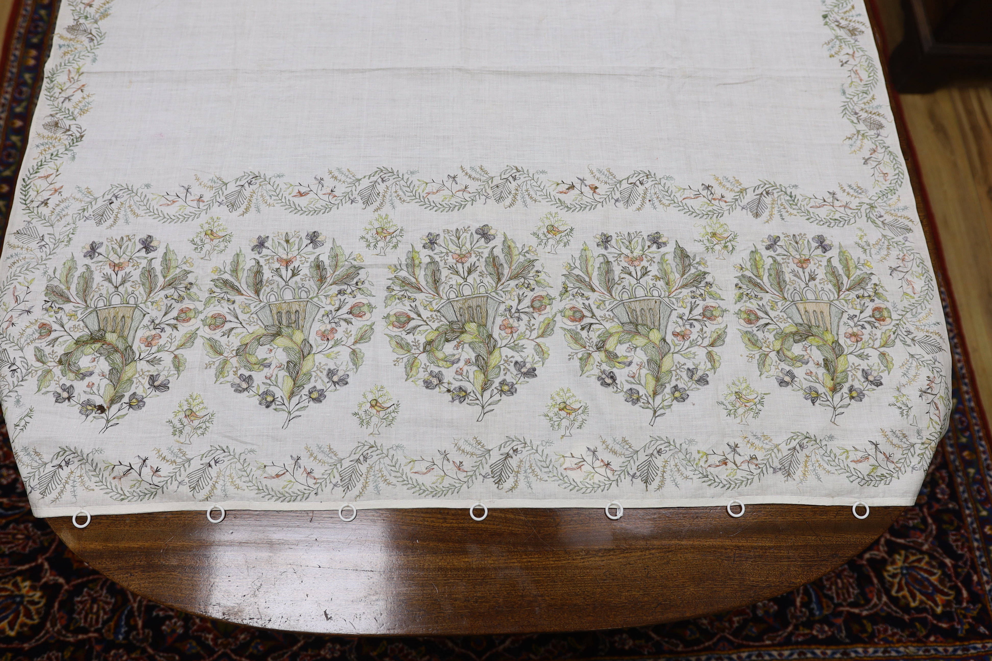 A late 18th-19th century fine linen chain stitched floral embroidered panel, possibly Kashmiri, using traditional design elements and embroidery similar from earlier embroideries of this kind worked on narrower looms, 22